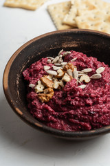 Beetroot hummus with walnuts sunflower seeds