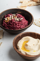 Beetroot hummus with walnuts, sunflower seeds and chickpeas hummus