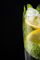 Cold summer drink on black background