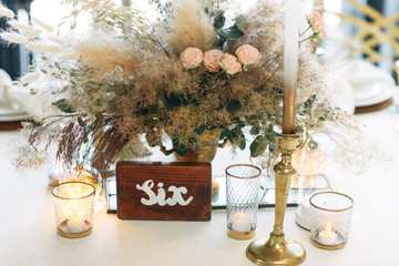 Wedding party in boho style in warm brown