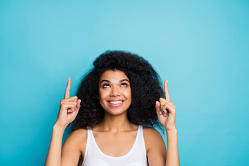 Close-up portrait of her she nice attractive glad cheerful confident wavy-haired girl pointing two forefingers up advice advert solution isolated over bright vivid shine vibrant blue color background