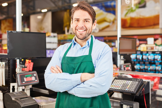 Man as a satisfied seller or cashier