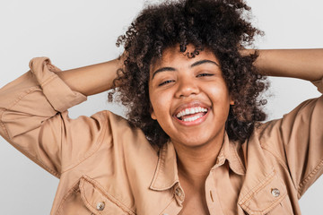 Afro-american woman playing with her hair