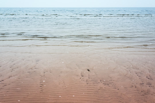 Empty sandy beach background photo. Baltic sea
