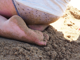 Child playing on the beach
