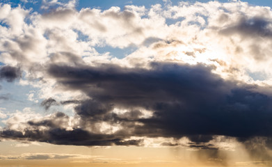 Fototapeta premium Fantastic dark thunderclouds at sunrise