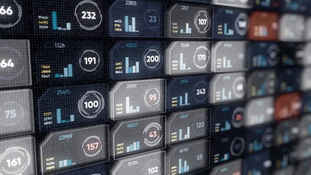 Digital display with colorful rows of small same size microchips with numbers and moving lines on black background, seamless loop. Animation. Futuristic and technological concept.