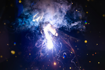 Abstract background of welding sparks.