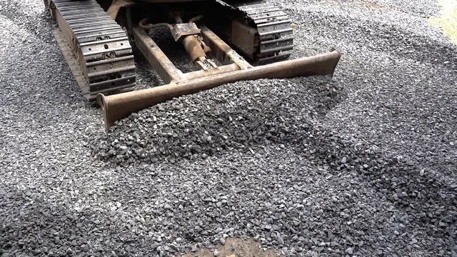 Dozers are leveling the area for the construction or repair of rural roads background.