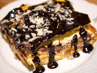 Delicious chocolate cake in white plate