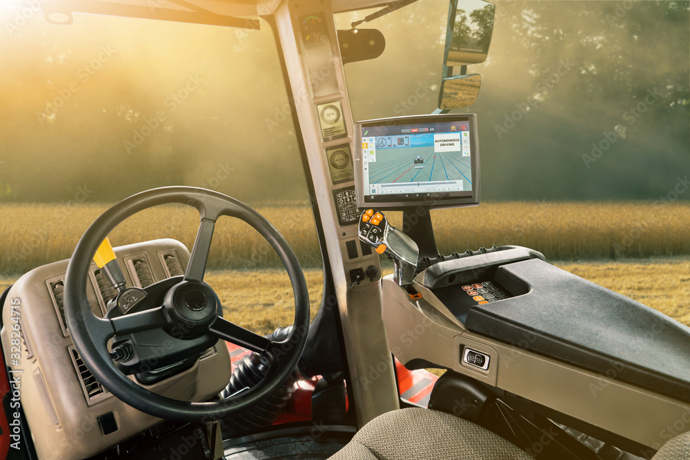 Poster autonomous tractor working on the field. smart farming
