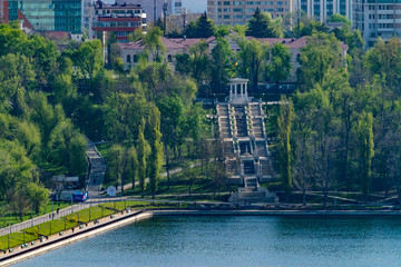 Valea Morilor park with Valea Morilor lake and Scara Cascadelor viewed from above in Chisinau, Moldova on a sunny spring day. It is one of the most popular parks in Chisinau, Moldova