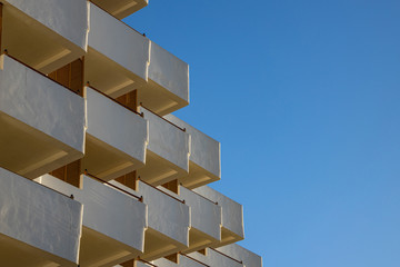 interesting original elements of the balconies in the white building