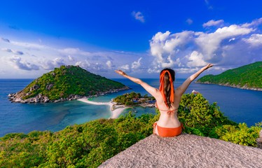  Asian woman visit the hilltop viewpoint at Nang yuan island,Surat thani,Thailand.