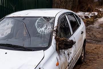 Passenger car involved in an accident with a broken windshield