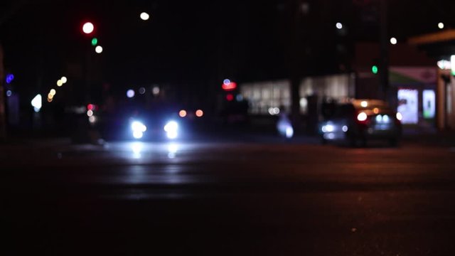 cars at night on a city road