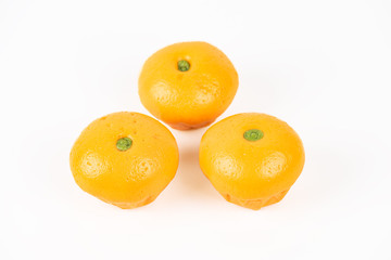 Pork dumpling in cartoon style,Pork bun like an orange in a white plate on the indoor dining table