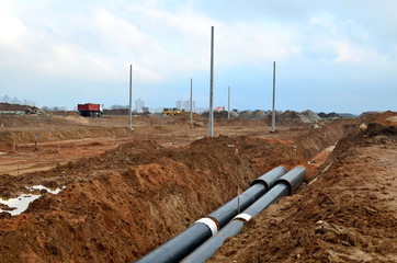 Laying underground storm sewers at a construction site. Groundwater system for new residential...