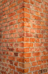 Old cracked red brick wall