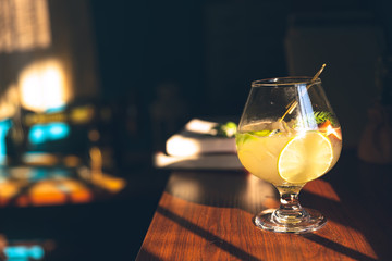 The sun shines into the room, and drinks of all colors look delicious