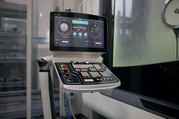 INDUSTRY COMPUTER, MONITOR IN FACTORY. SCREEN AND BUTTON. 