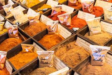 Assorted spices on a market stall. 