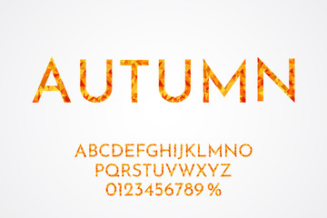 Vector illustration. Minimalistic font. Low poly style. Polygonal style. Autumn concept. Color of fallen leaves: orange, yellow, red. Letter from triangular shapes. Abstract lettering for design