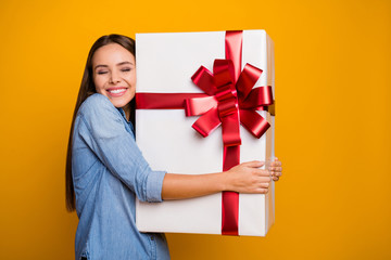 Portrait of sweet pretty cheerful girl hug her gift box she get on 14-february 8-march event...