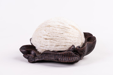 The snow-white bird's nest is a popular food，Dried swiftlet nests ready for cooking on white background.