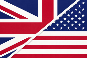 Fototapeta na wymiar USA vs Great Britain national flag from textile. Relationship, between american and european countries.