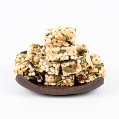 Processed nut biscuits on wooden table