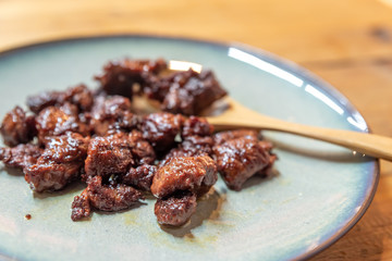The process of cooking beef