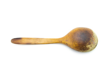 Old shabby wooden spoon handmade brown. Vintage scratched food accessory on a white isolated background. Flipped upside down
