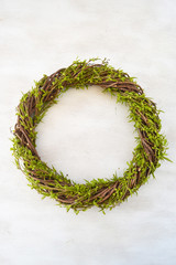 Handmade spring wreath isolated on white background. Copy space