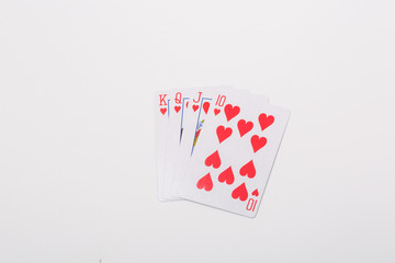 Expanded playing cards on white background
