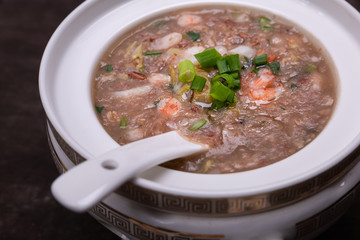 Chinese congee, rice with delicious accessories