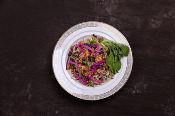 Vegetable salad on a white plate
