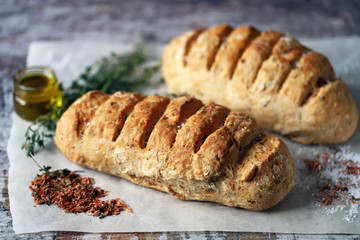 Homemade bread with Italian herbs and spices. Italian food.