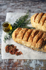Homemade bread with Italian herbs and spices. Italian food.