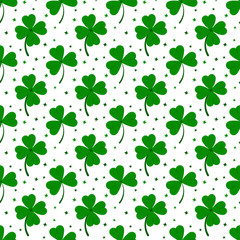 Clover leaves seamless pattern isolated on white background: green lucky four leaf clover and shamrock clover.