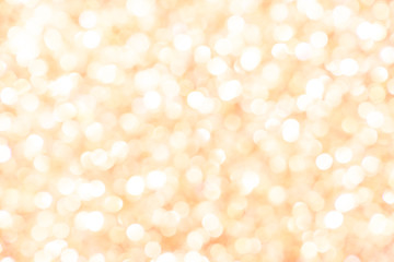 Abstract glowing yellow-orange background, texture, glitter vintage glare, bokeh background