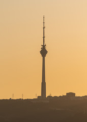 Fototapeta na wymiar TV tower in Baku city at sunset
