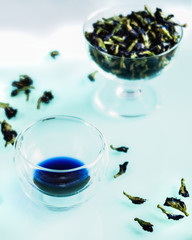 Anchang tea (clitoria), on a white background, clitoria flowers (anchanga),  transparent cup