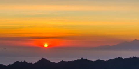 Sunrise panorama view from top of Batur volcano