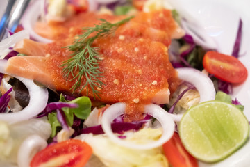 Salmon sashimi with spicy hot sauce