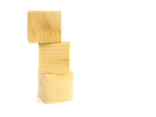 three wooden cubes isolated on a white background