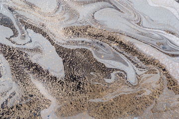 Abstract marble background or texture. Monochrome gray waves and gold particles pattern. Acrylic Fluid Art