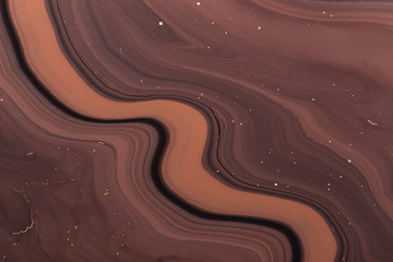 Abstract wavy brown lines and golden sparkles. Art Deco marbling background or texture. Acrylic Fluid Art