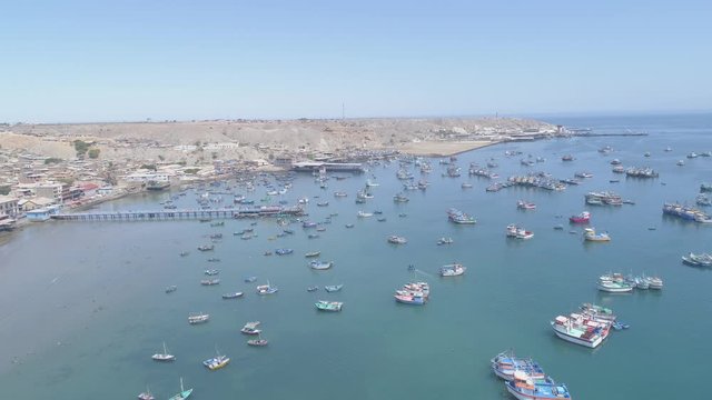 Right travelling camera move in Paita Harbor at a clear morning in Piura Region, Peru