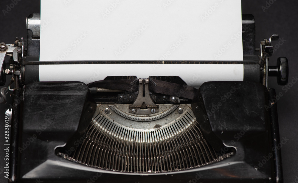 Fototapete typewriter with paper sheet. space for your text